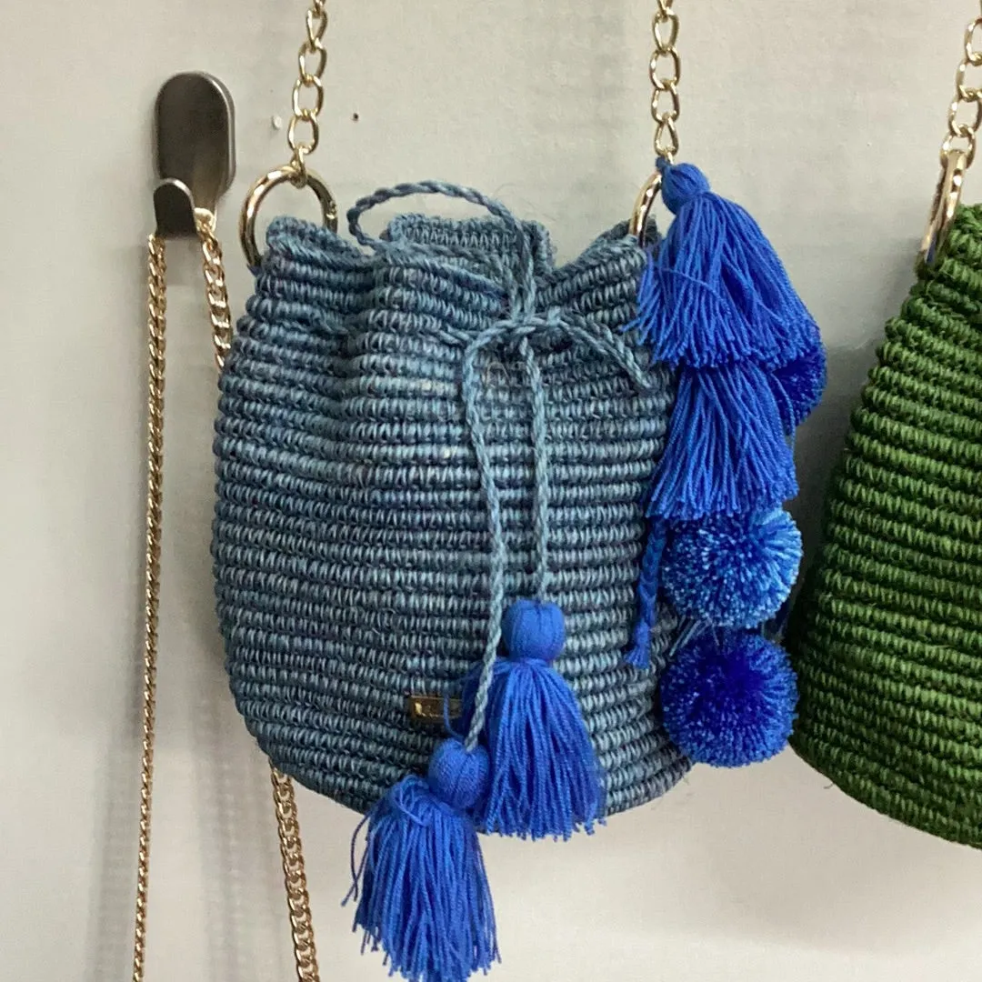 Bucket bag with Pom Poms